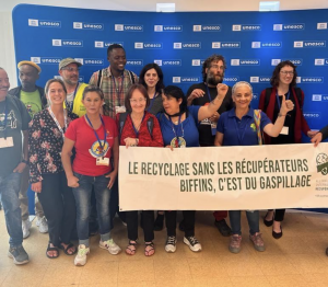 International Organizing About Waste Group of women smiles for photograph; they are community organizers from around the world.