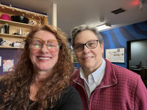 Lisa Loving and Jan McManus of We Shine Two women smiling in a radio station lobby