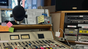 A close-up of the KBOO studio board & microphone