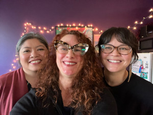 three women smiling