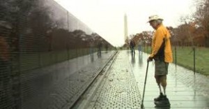S. Brian Willson in front of the Vietnam Veterans Memorial Wall S. Brian Willson in front of the Vietnam Veterans Memorial Wall