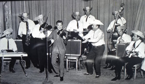Black and white photo of Bob Wills & his Texas Playboys with Wade Ray on fiddle