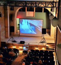 Inside Athena's Gem Theatre for a showing of "Sasquatch, the Legend of Bigfoot" (1976) Inside Athena's Gem Theatre for a showing of "Sasquatch, the Legend of Bigfoot" (1976)