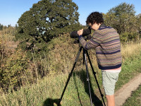 Ezra Cohen watching birds on the bluff above Oaks Bottom