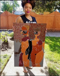 Sade' Beasley Artist Sade Beasley holding one of her original art pieces